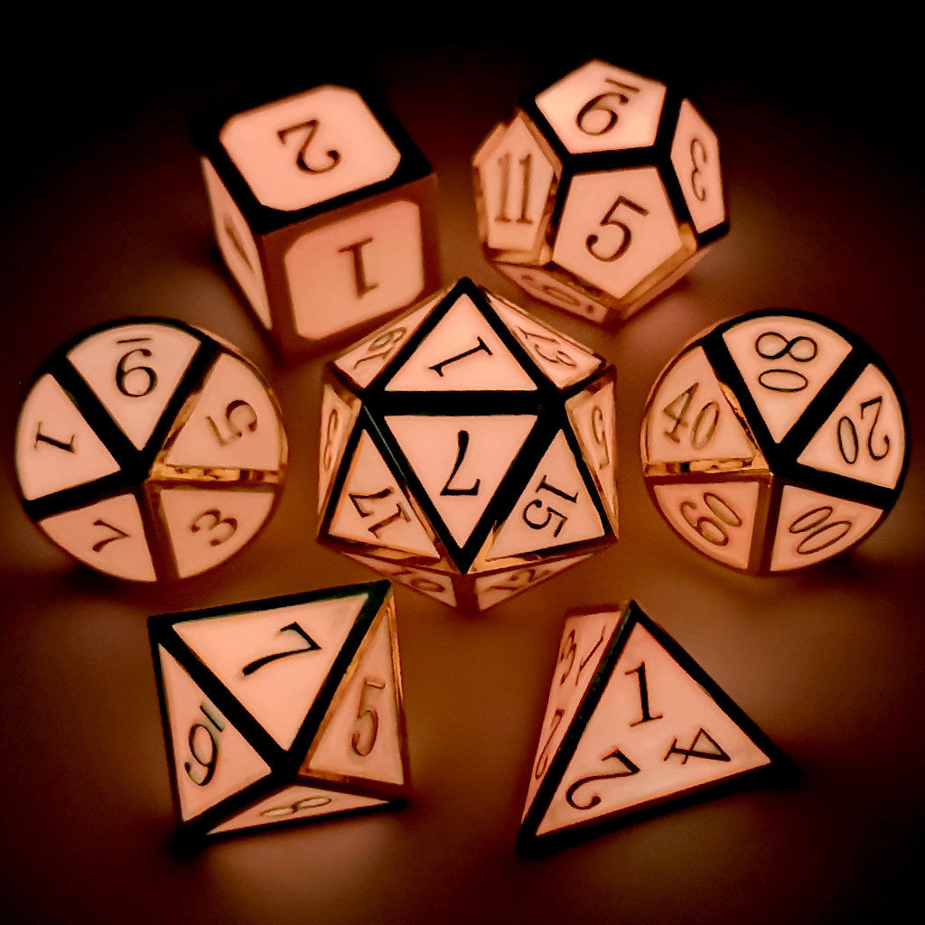 Metal dnd dice set glow in the dark gold glowing pink