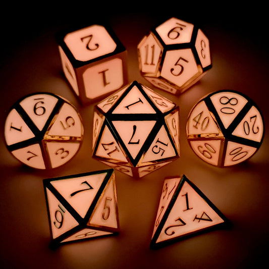 Metal dnd dice set glow in the dark gold glowing pink