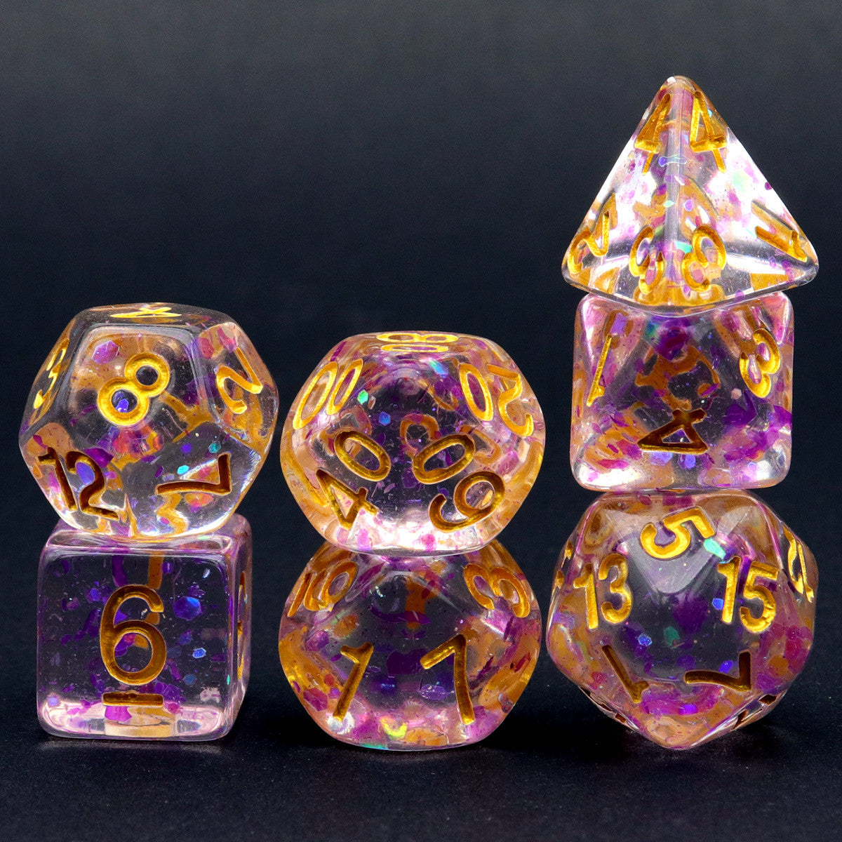 purple dice, green dice, glitter dice