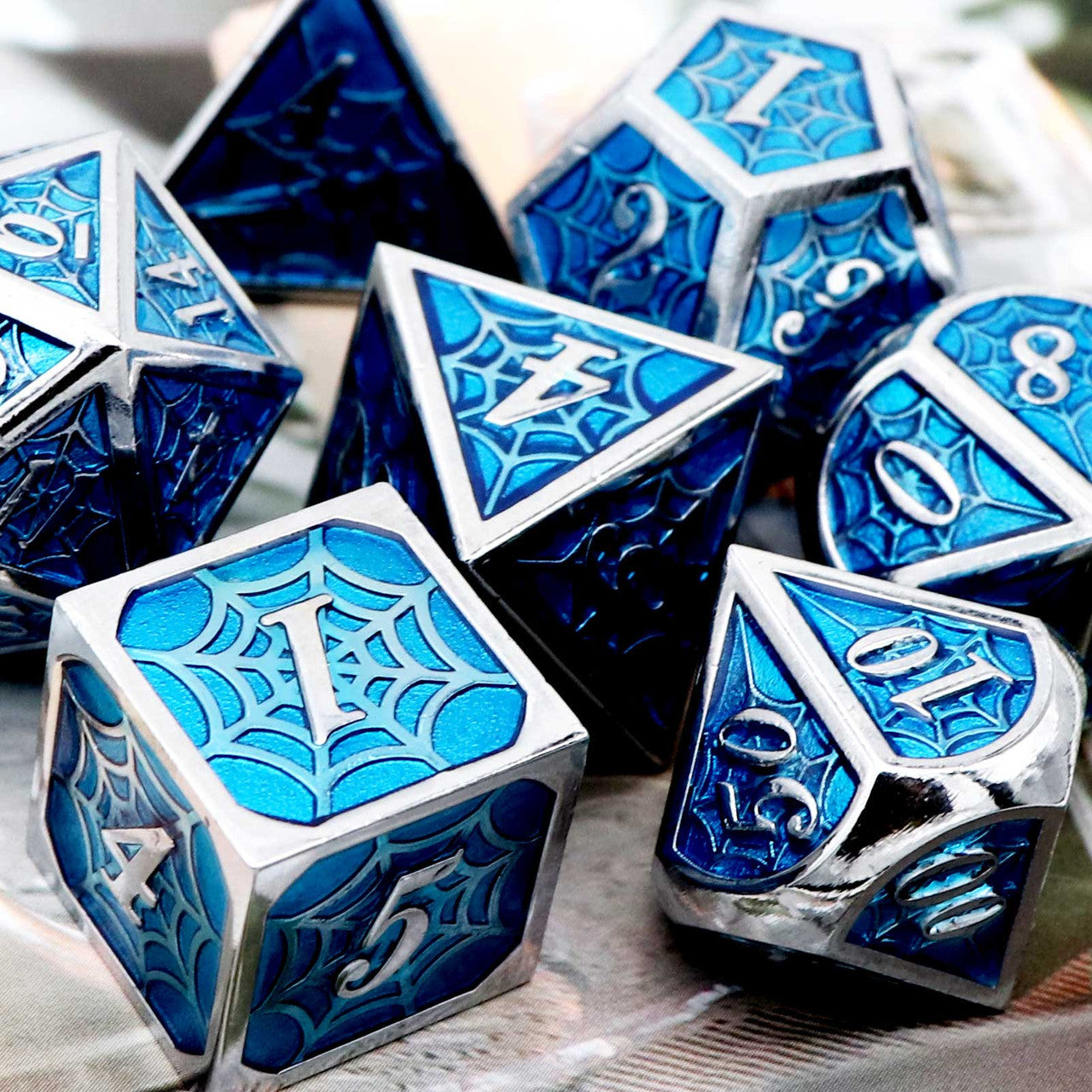 haxtec dice, blue dice, metal dice blue, dnd dice, the net dice, net dice, silver blue dice, silver metal dice