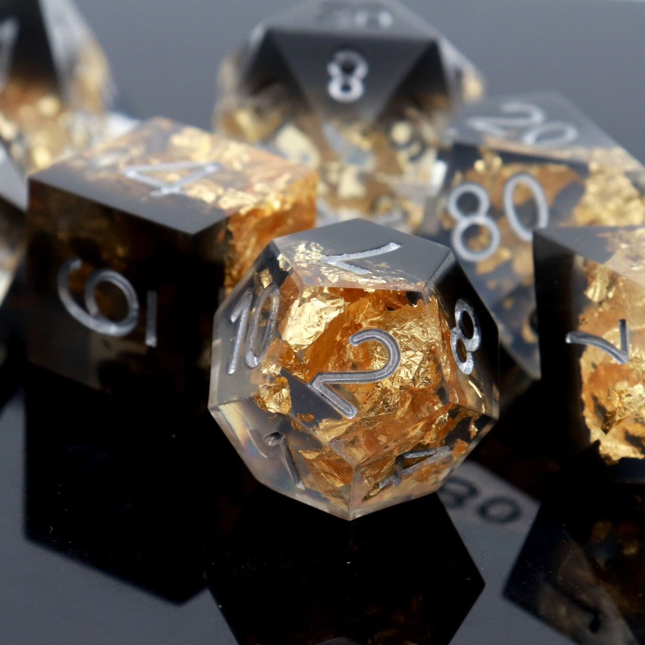 black clear gold foil resin dice set dnd sharp edge dice by haxtec