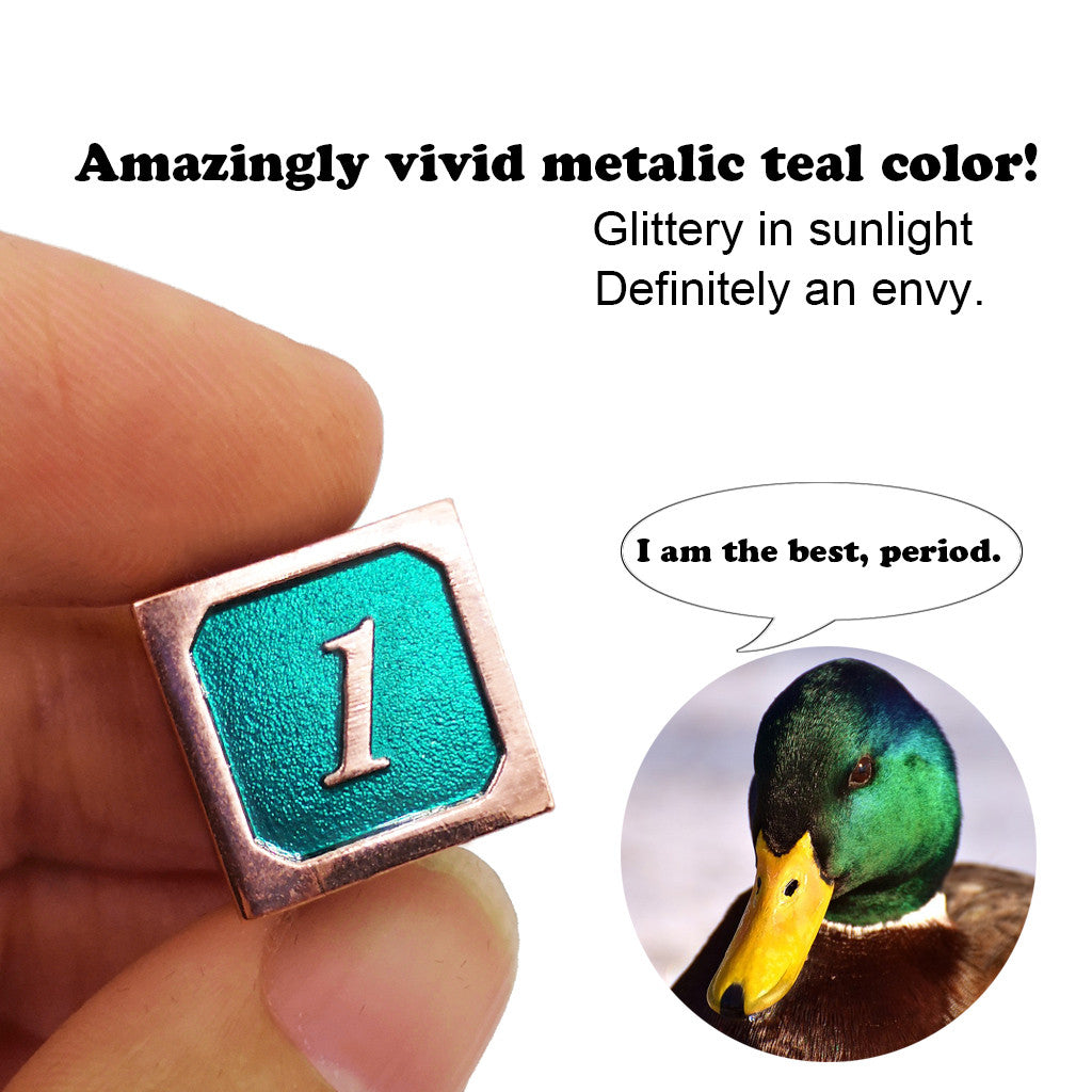 Metal dice set copper teal green details