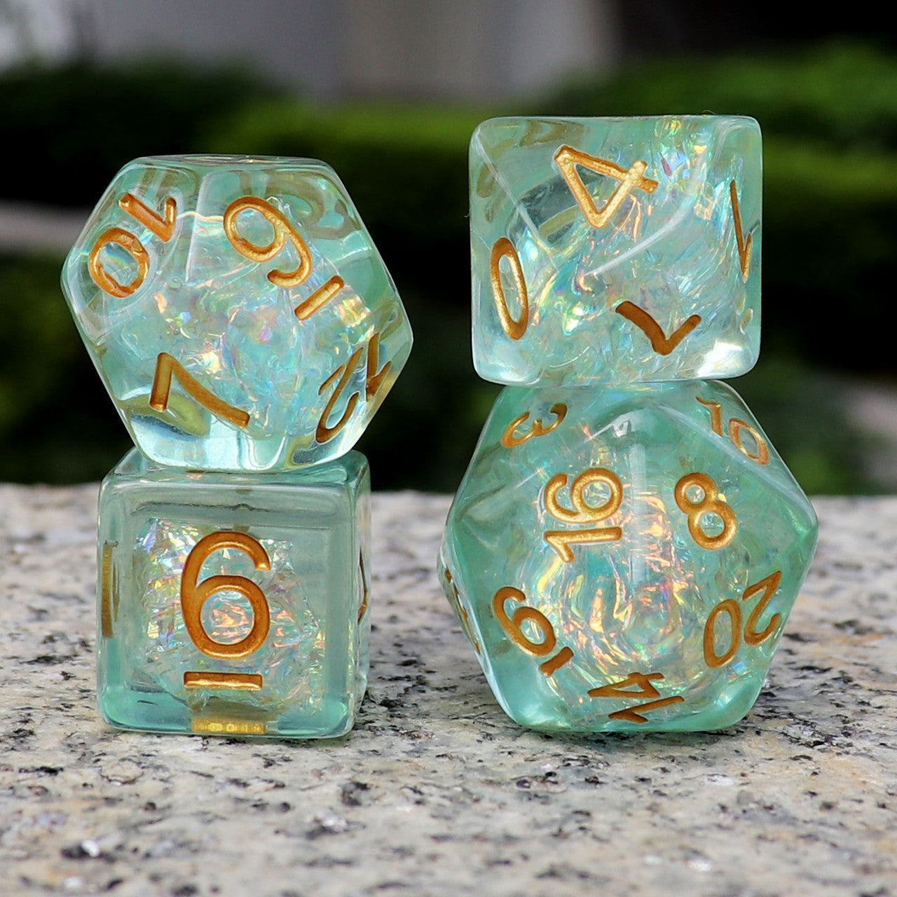 Iridescent dice, green dice