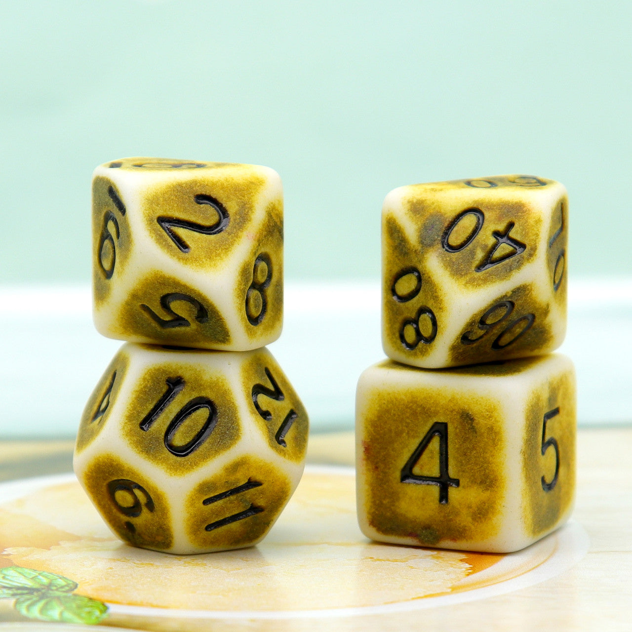 ancient dice, antique dice, bone dice, yellow dice, polyhedral dice, rpg dice, dice set,