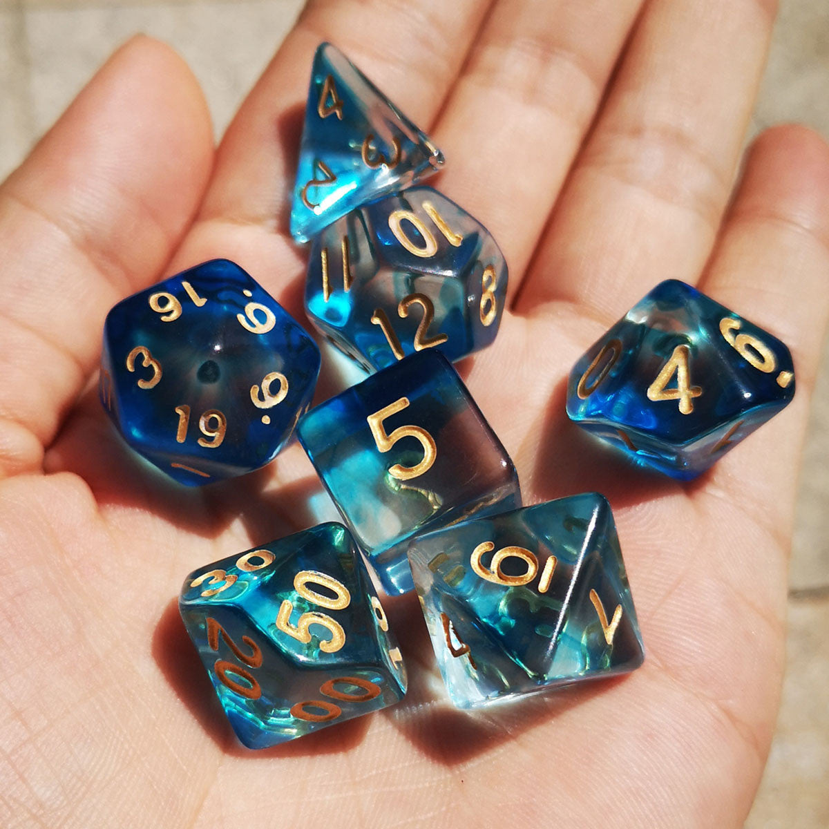 blue dice, clear dice, dnd dice, rpg dice, polyhedral dice, translucent dice, vapor dice, wisp dice, ink dice, swirl dice