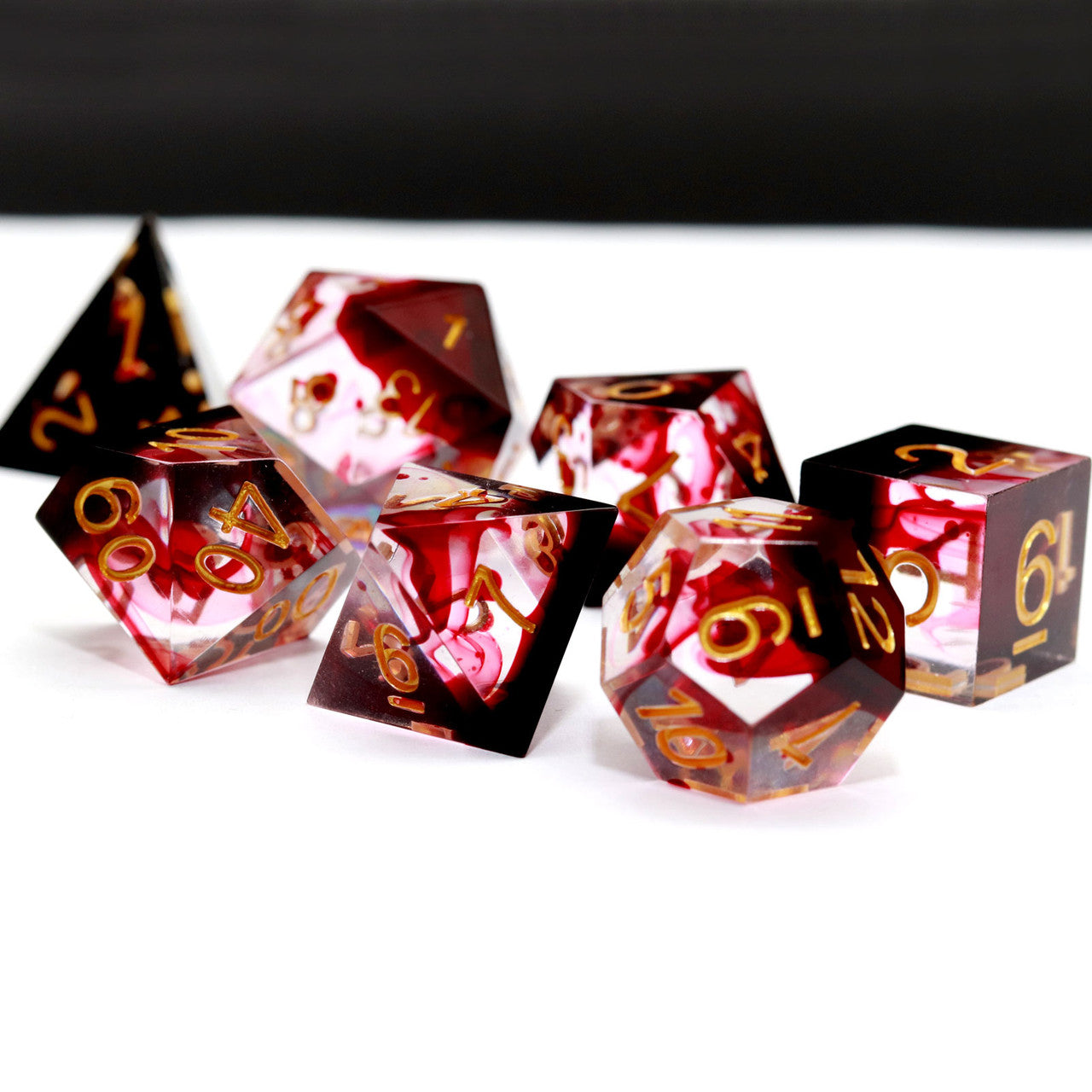 red blood swirl sharp edge dice set with dice case