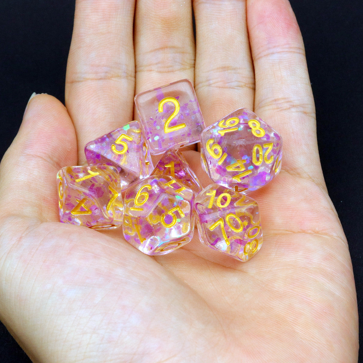 glitter flakes, rpg dice,