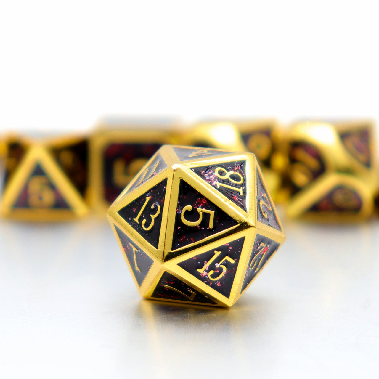 gold black red metal dice, glitter metal dice, gold metal dice, black and red glitter metal dice, haxtec glitter metal dice, glitter metal dice