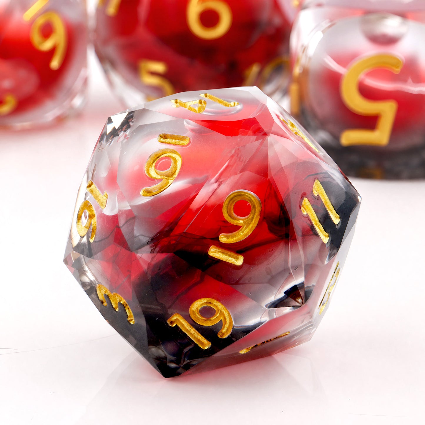 Haxtec Crimson Nebula Liquid Core Dice – Diamond-Cut Resin Set with Metal Case