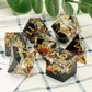 Haxtec Black Pearl Winter Flower Sharp Edge Resin D&D Dice Set with Metal Case