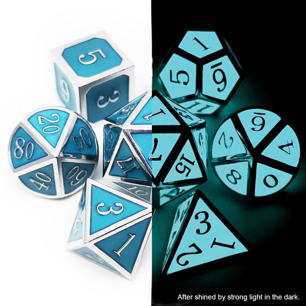 Metal dice set glow in the dark silver glowing blue comparing